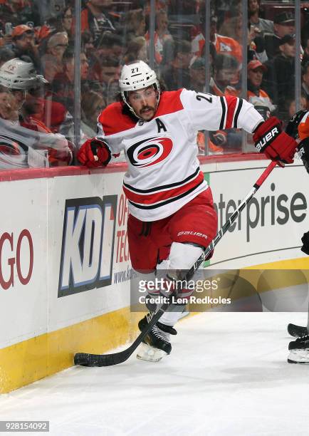 Justin Faulk of the Carolina Hurricanes in action along the boards against the Philadelphia Flyers on March 1, 2018 at the Wells Fargo Center in...