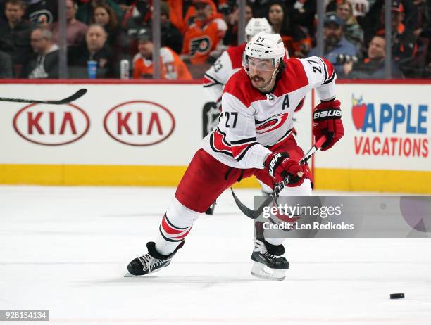 Justin Faulk of the Carolina Hurricanes skates the puck against the Philadelphia Flyers on March 1, 2018 at the Wells Fargo Center in Philadelphia,...