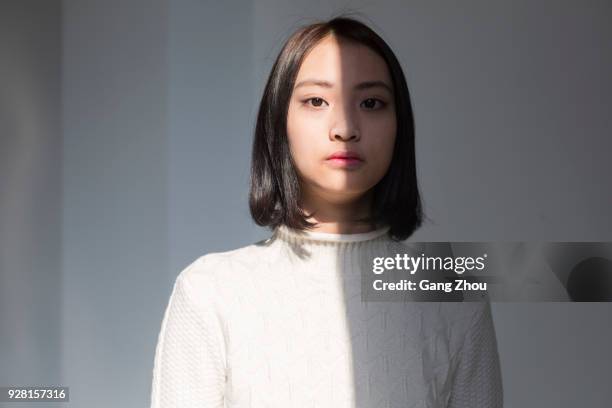 shadow of young woman,portrait - asian woman face stock pictures, royalty-free photos & images