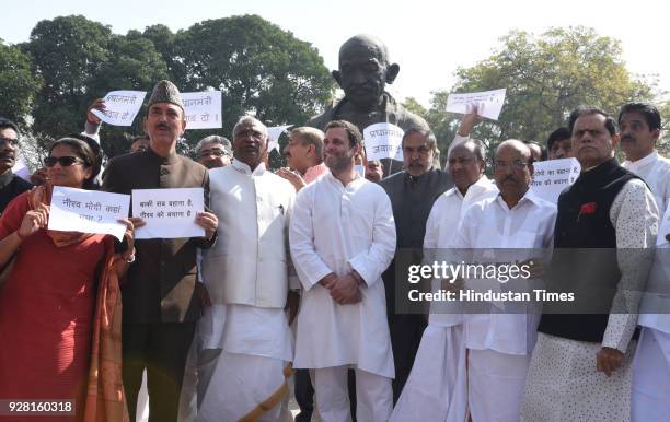 President of Indian National Congress and Lok Sabha MP Rahul Gandhi with Leader of the Opposition Lok Sabha Mallikarjun Kharge, Leader of the...