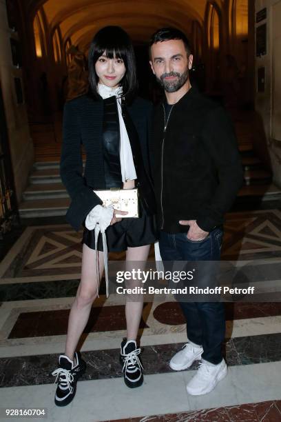 Tang Yan and Stylist Nicolas Ghesquiere pose after the Louis Vuitton show as part of the Paris Fashion Week Womenswear Fall/Winter 2018/2019 on March...