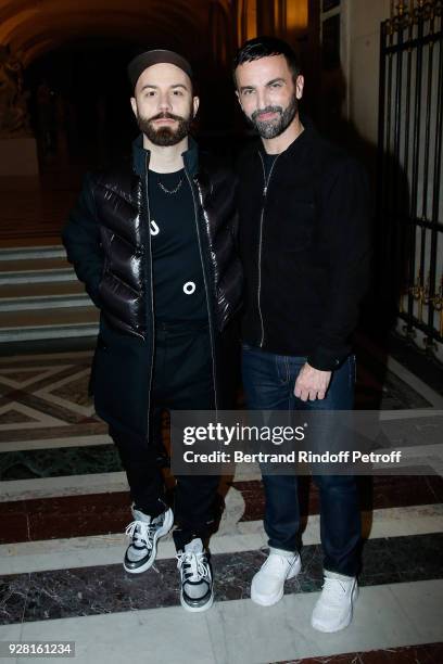 Woodkid and Stylist Nicolas Ghesquiere pose after the Louis Vuitton show as part of the Paris Fashion Week Womenswear Fall/Winter 2018/2019 on March...