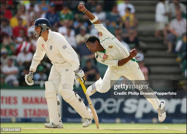 Makhaya Ntini of South Africa bowls past England batsman Marcus Trescothick during the 4th Test match between South Africa and England at the New...