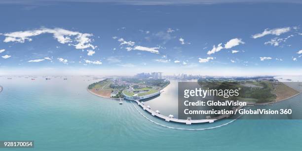 picturesque aerial view of marina barrage and marina channel in singapore - singapore city aerial stock pictures, royalty-free photos & images