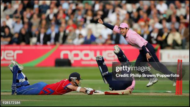 Essex batsman James Foster survives the runout attempt by Middlesex wicketkeeper Ben Scott as Ed Joyce starts to celebrate prematurely during the...