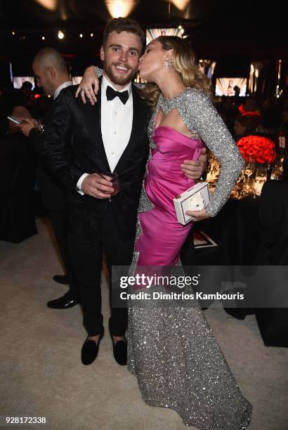 Gus Kenworthy and Miley Cyrus attend the 26th annual Elton John AIDS Foundation Academy Awards Viewing Party sponsored by Bulgari, celebrating EJAF...