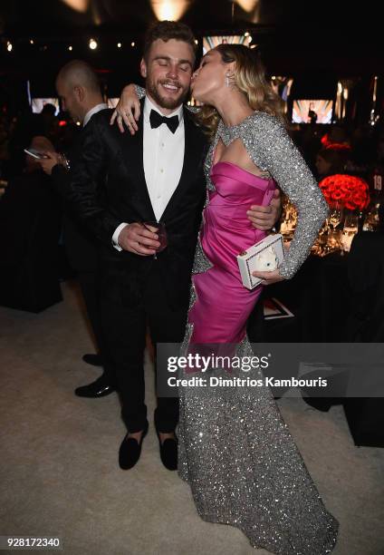 Gus Kenworthy and Miley Cyrus attend the 26th annual Elton John AIDS Foundation Academy Awards Viewing Party sponsored by Bulgari, celebrating EJAF...