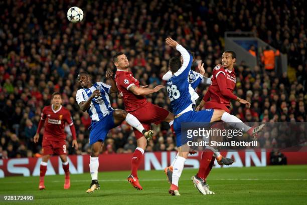 Dejan Lovren of Liverpool wins a header during the UEFA Champions League Round of 16 Second Leg match between Liverpool and FC Porto at Anfield on...