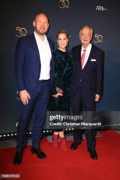 Anika Decker, her brother Jan Decker and Bernd Neumann attend the 50th anniversary celebration of FFA at Pierre Boulez Saal on March 6, 2018 in...