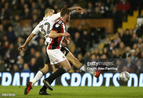 Aleksandar Mitrovic of Fulham scores his sides second goal during the Sky Bet Championship match between Fulham and Sheffield United at Craven...