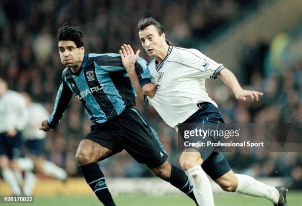 Richard Shaw of Coventry City tussles with David Ginola of Tottenham Hotspur during an FA Carling Premiership match at Highfield Road on December 13,...