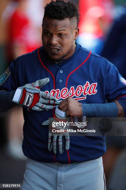 Erik Aybar of the Minnesota Twins walks in the dugout during the Spring Training game against the Philadelphia Phillies at Spectrum Field on March...