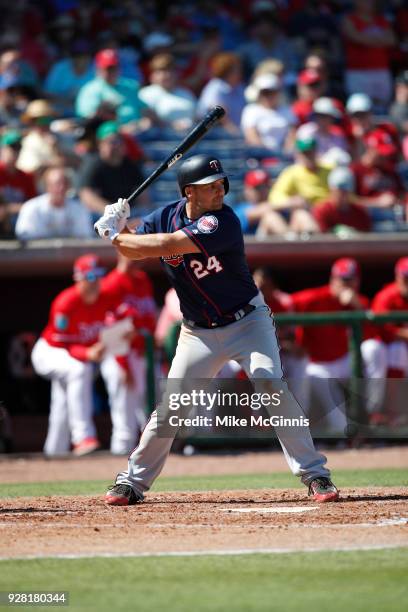 Chris Heisey of the Minnesota Twins gets ready for the next pitch during the Spring Training game against the Philadelphia Phillies at Spectrum Field...