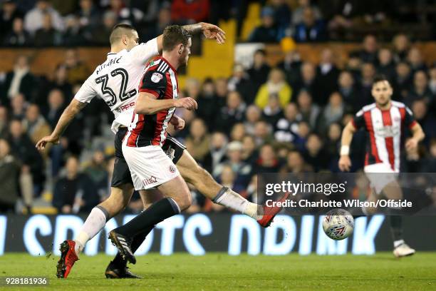 Aleksandar Mitrovic of Fulham scores their 2nd goal during the Sky Bet Championship match between Fulham and Sheffield United at Craven Cottage on...