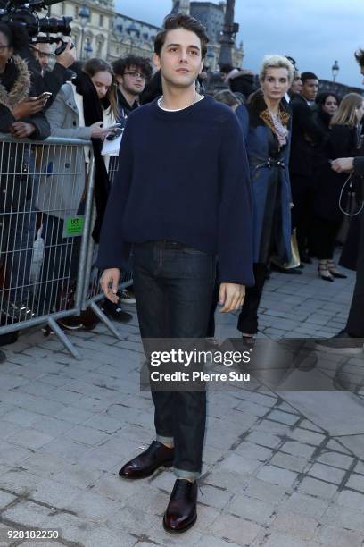 Xavier Dolan attends the Louis Vuitton show as part of the Paris Fashion Week Womenswear Fall/Winter 2018/2019 on March 6, 2018 in Paris, France.