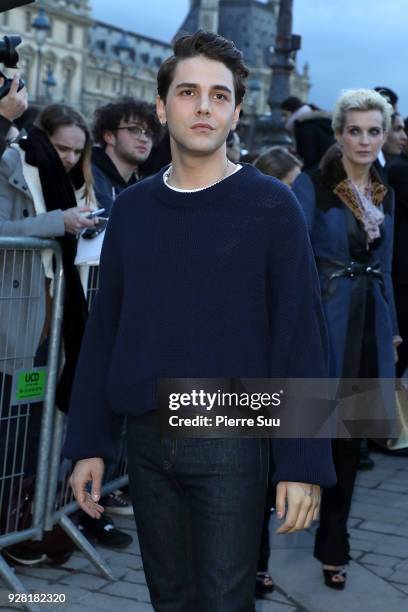 Xavier Dolan attends the Louis Vuitton show as part of the Paris Fashion Week Womenswear Fall/Winter 2018/2019 on March 6, 2018 in Paris, France.