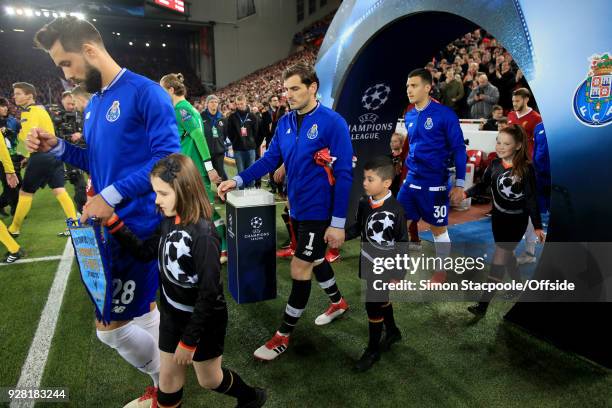 Porto goalkeeper Iker Casillas walks out flanked by Felipe and Diogo Dalot during the UEFA Champions League Round of 16 Second Leg match between...
