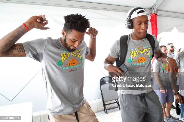 Derrick Jones Jr. #5 and Josh Richardson of the Miami Heat participate in the 2018 Family Festival at the American Airlines Area on March 4, 2018 in...