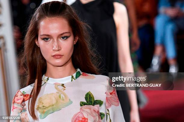 Model presents a creation for Paul & Joe during the 2018/2019 fall/winter collection fashion show on March 6, 2018 in Paris. / AFP PHOTO / BERTRAND...