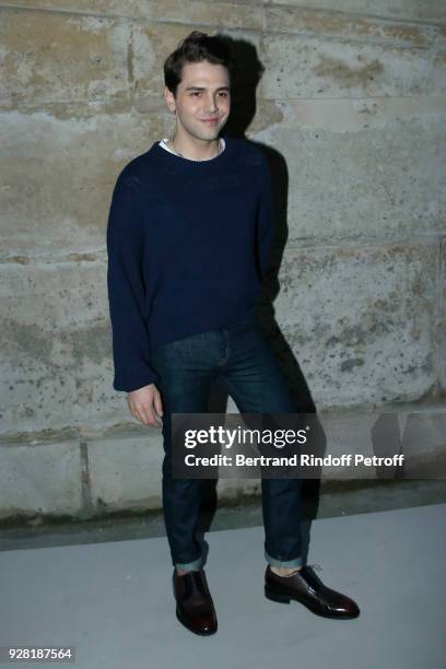 Xavier Dolan attends the Louis Vuitton show as part of the Paris Fashion Week Womenswear Fall/Winter 2018/2019 on March 6, 2018 in Paris, France.