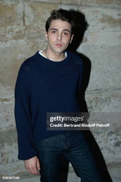 Xavier Dolan attends the Louis Vuitton show as part of the Paris Fashion Week Womenswear Fall/Winter 2018/2019 on March 6, 2018 in Paris, France.