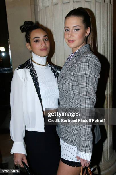 Camelia Jordana and Adele Exarchopoulos attend the Louis Vuitton show as part of the Paris Fashion Week Womenswear Fall/Winter 2018/2019 on March 6,...