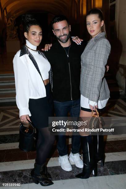 Camelia Jordana, Stylist Nicolas Ghesquiere and Adele Exarchopoulos pose after the Louis Vuitton show as part of the Paris Fashion Week Womenswear...