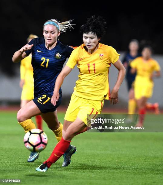 March 6, 2018: Ellie Carpenter of Australia vies with Wang Shuang of China during the Group A last round match between China and Australia at the...