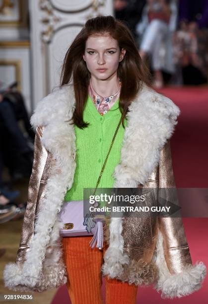 Model presents a creation for Paul & Joe during the 2018/2019 fall/winter collection fashion show on March 6, 2018 in Paris. / AFP PHOTO / BERTRAND...