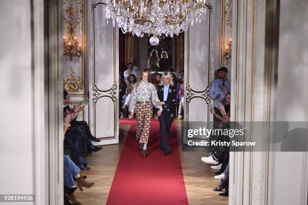 Designer Sophie Mechaly acknowledges the audience with a model during the Paul & Joe show as part of Paris Fashion Week Womenswear Fall/Winter...