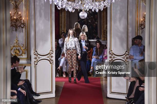 Designer Sophie Mechaly acknowledges the audience with a model during the Paul & Joe show as part of Paris Fashion Week Womenswear Fall/Winter...