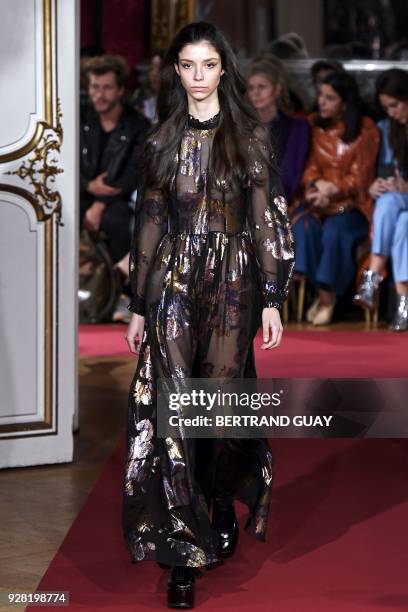 Model presents a creation for Paul & Joe during the 2018/2019 fall/winter collection fashion show on March 6, 2018 in Paris. / AFP PHOTO / BERTRAND...