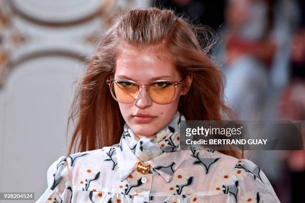 Model presents a creation for Paul & Joe during the 2018/2019 fall/winter collection fashion show on March 6, 2018 in Paris. / AFP PHOTO / BERTRAND...