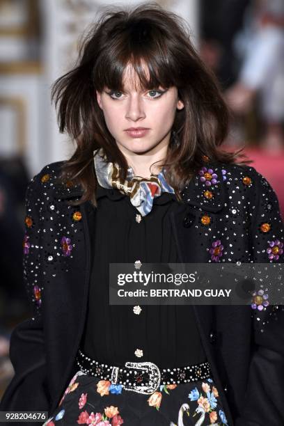 Model presents a creation for Paul & Joe during the 2018/2019 fall/winter collection fashion show on March 6, 2018 in Paris. / AFP PHOTO / BERTRAND...