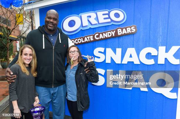 Basketball Hall of Famer Shaquille ONeal hands out free OREO Chocolate Candy Bars at the Snack Shaq to kick off his shared birthday with OREO March...