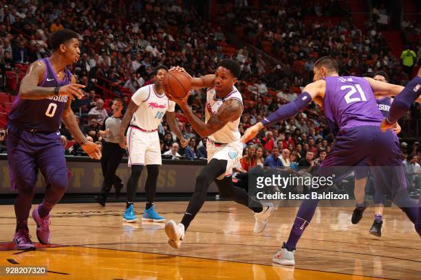 Rodney McGruder of the Miami Heat handles the ball during the game against the Phoenix Suns on March 5, 2018 at American Airlines Arena in Miami,...