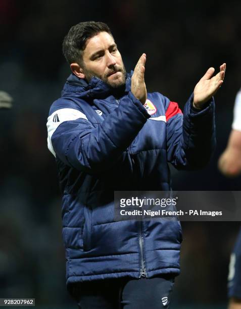 Bristol City manager Lee Johnson applauds the fans after the Sky Bet Championship match at Deepdale, Preston.