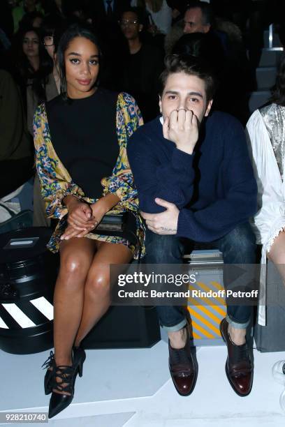 Laura Harrier and Xavier Dolan attend the Louis Vuitton show as part of the Paris Fashion Week Womenswear Fall/Winter 2018/2019 on March 6, 2018 in...