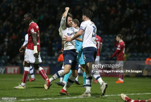 Preston North End's Ben Pearson and Greg Cunningham celebrate after the final whistle of the Sky Bet Championship match at Deepdale, Preston.