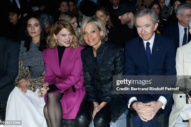 Jennifer Connelly, Lea Seydoux, Helene Arnault and Owner of LVMH Luxury Group Bernard Arnault attend the Louis Vuitton show as part of the Paris...