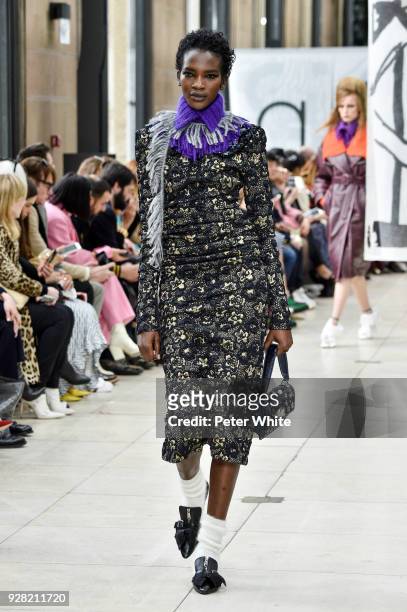 Aamito Lagum walks the runway during the Miu Miu show as part of the Paris Fashion Week Womenswear Fall/Winter 2018/2019 on March 6, 2018 in Paris,...
