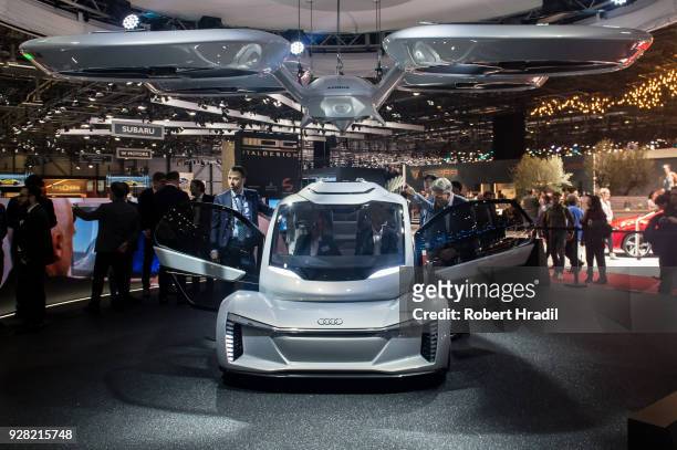 The 'Pop.up next' concept flying car, a hybrid vehicle that blends a self-driving car and passenger drone by Audi, italdesign and Airbus is seen at...