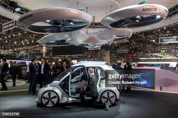 The 'Pop.up next' concept flying car, a hybrid vehicle that blends a self-driving car and passenger drone by Audi, italdesign and Airbus is seen at...
