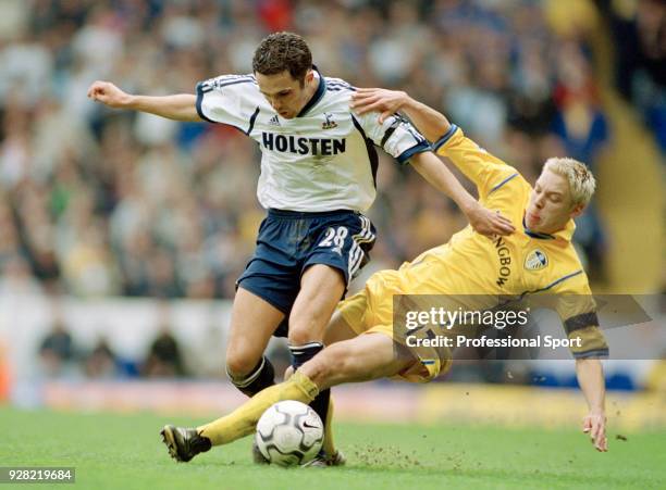 Alan Smith of Leeds United tackles Matthew Etherington of Tottenham Hotspur during an FA Barclaycard Premiership match at White Hart Lane on April 1,...