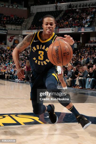 Joe Young of the Indiana Pacers handles the ball during the game against the Milwaukee Bucks on March 5, 2018 at Bankers Life Fieldhouse in...