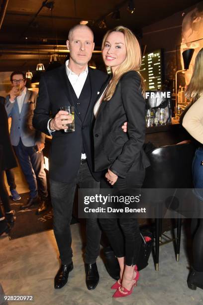 Jean-David Malat and Noelle Reno attend the opening of "FRAME", an exhibition of photographs by Alan Chapman, at BXR London on March 6, 2018 in...