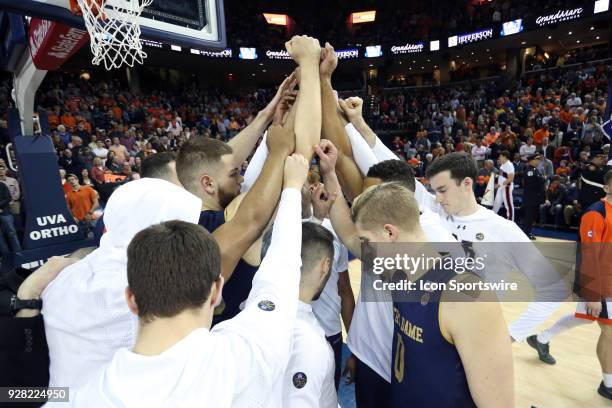 Notre Dame players huddle before the game. The University of Virginia Cavaliers hosted the University of Notre Dame Fighting Irish on March 3, 2018...