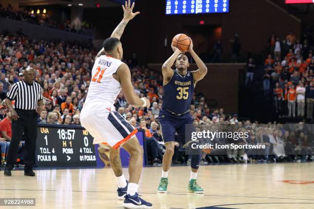 Notre Dame's Bonzie Colson shoots over Virginia's Isaiah Wilkins . The University of Virginia Cavaliers hosted the University of Notre Dame Fighting...