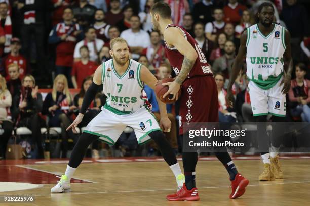 Anton Ponkrashov of Unics Kazan vies Stefan Jovic of Bayern Muenchen during the EuroCup Quarterfinal Round 1 match between FC Bayern Munich and Unics...