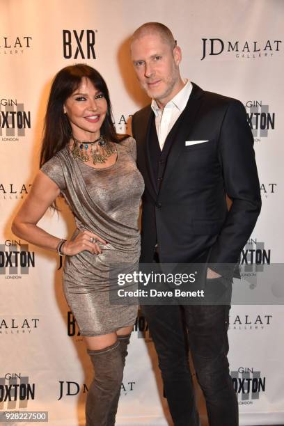 Lizzie Cundy and Jean-David Malat attend the opening of "FRAME", an exhibition of photographs by Alan Chapman, at BXR London on March 6, 2018 in...